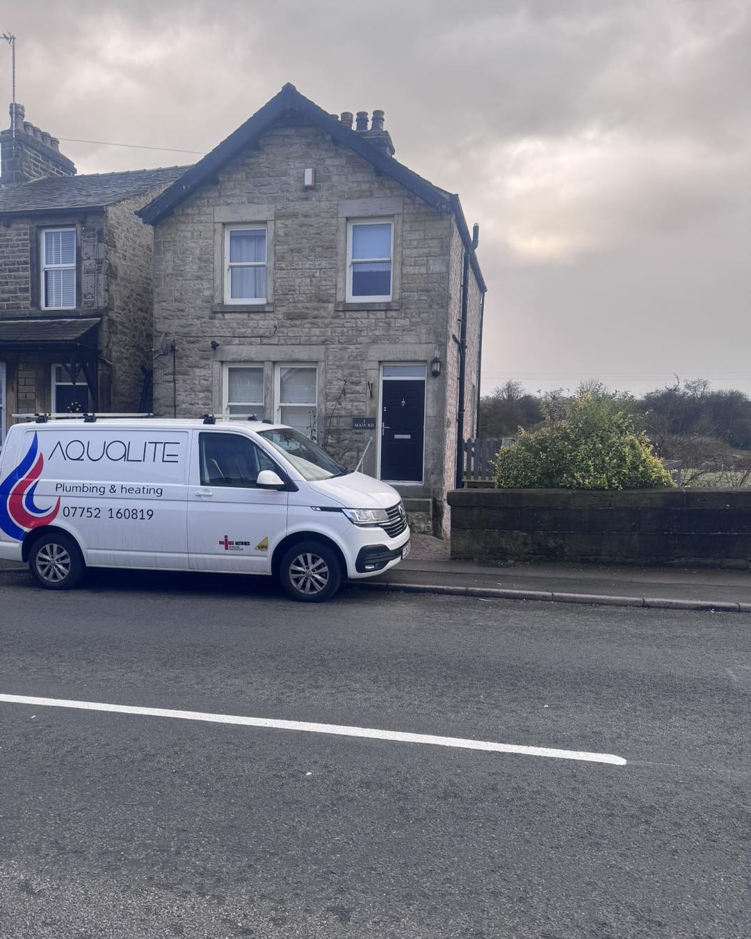 Aqualite Plumbing Lancaster van outside a customer property